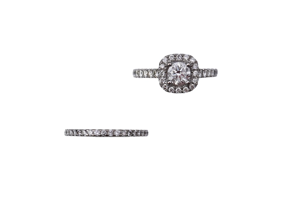 A diamond engagement ring and half eternity ring